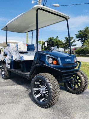 EZGO Express L6 72v 6-Passenger in Patriot Blue w/ upgraded tires