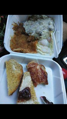 Breakfast chicken fried steak with my toast on the side I didn't want to get gravy on it... Lol