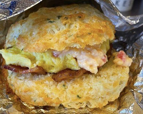 The Charleston - cheddar biscuit, pimento cheese, eggs and bacon.