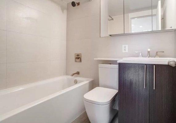 All apartments have new marble bathrooms with granite banjo countertops and oversized medicine cabinet.