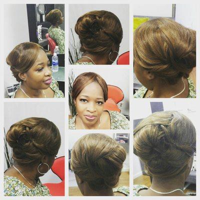 Full head weave and updo for a wedding.