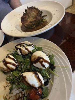 Bruschetta with arugula, and burrata and a stuffed artichoke appetizer