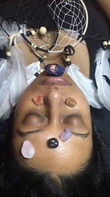 Holistic facial and gua stone