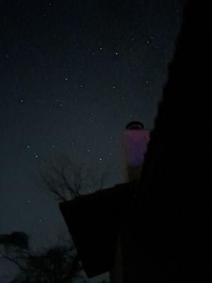 Outside photo of chimney under the stars.