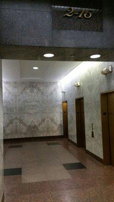 The alcove near the 6th Street entrance with the elevators to the 6th floor where the Social Security Office is