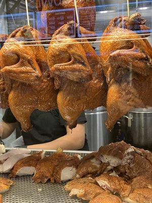 Chickens hanging ready to be eaten