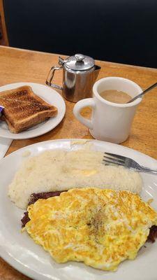 Grits, toast, cb hash, eggs and coffee.