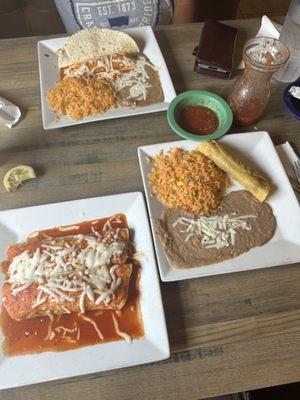 Chicken tamales with rice and beans and chicken and beef burritos with beef, taquitos, rice, and beans.