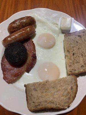 Bangers, blood pudding, and rasher, eggs and toast