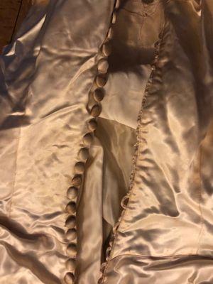 Original condition of the gown prior to bringing it to Jeeves.