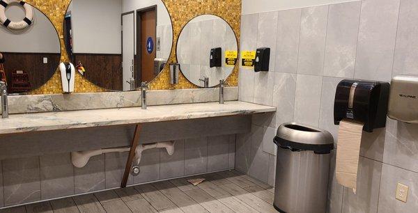 I loved this hand washing station. Completely enjoyed this sink. Just a slab of granite tilted just enough to drain the water.