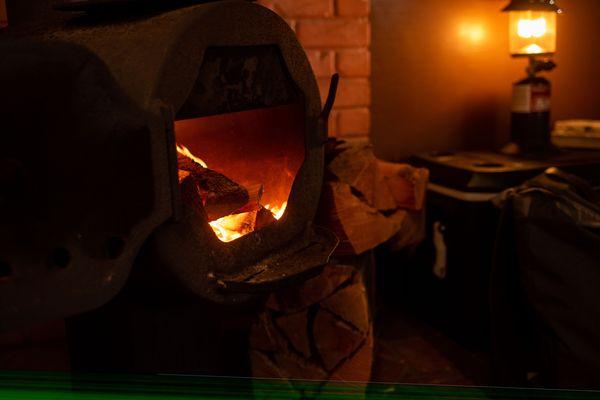 Wood burning fireplace inside every tent cabin