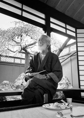 Mitsugi Saotome Shihan pauses during an afternoon in the rear gardens during the Annual Cherry Blossom Seminar.