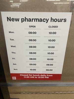 The posted hours for this former 24 hour pharmacy.