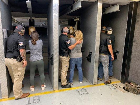 3 of the main Instructors each showing different shooting fundamentals.