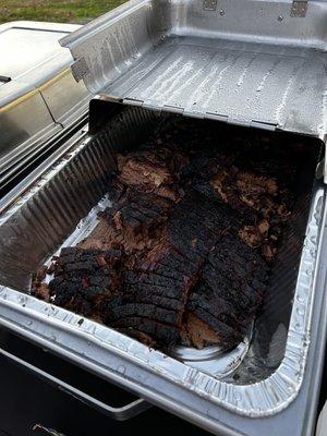 The brisket stayed hot and juicy. Signature BBQ sauce on the side!