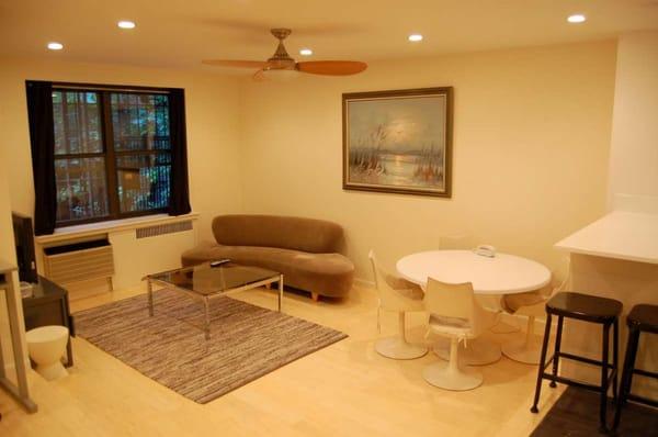 sample 2 BR apartment. Bamboo Floors, stainless steel appliances, recessed lighting, and modern furniture