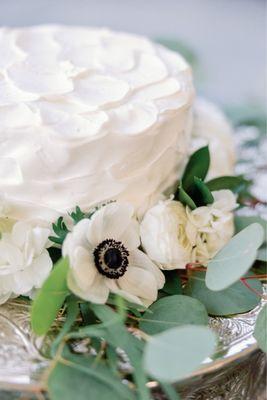 Beautiful, delicious, affordable wedding cake.  The frosting pattern was custom and live flowers were added by the wedding florist.  The s