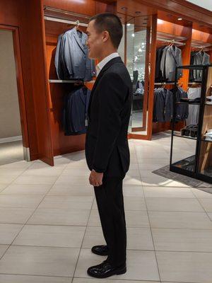 Trying on a basic black tux. Notch lapel.