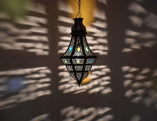 Tall Moroccan hanging lantern with multi-color eyelets