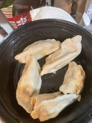 Fried dumplings and Mongolian beef it came undercooked. Do they look fried to you?