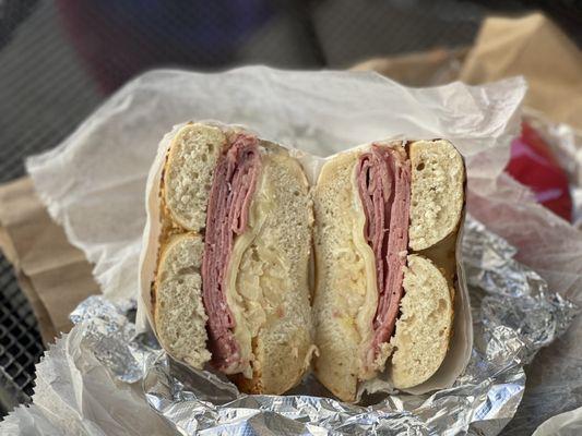 Supreme Reuben on a garlic bagel