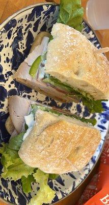 Roasted chicken with sliced Brie and mayo on fresh focaccia