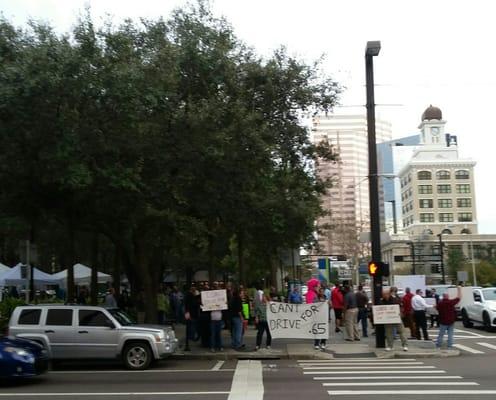 Uber drivers protesting January 2016 against reduced seasonal mileage rates. "Can't drive for .65"