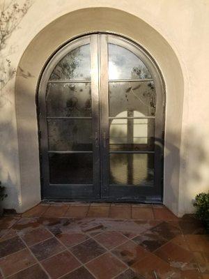 Arched steel doors