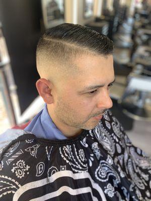 Clean and tight fade comb over