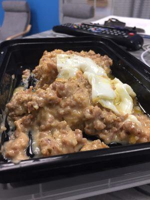 Sausage gravy & biscuits with a poached egg on top