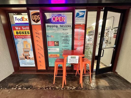 Table and stools out front. Very handy!