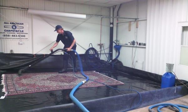 Kyle in our Professional Area Rug Wash Plant "pit"