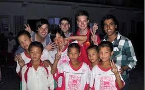 The Head Dragon, Ramsay, with children at the Shaolin orphanage.