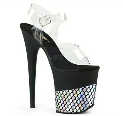 We are an authorized Pleaser Retailer and we make custom shoe designs in house