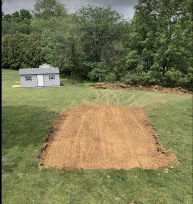 Grade out a spot for the pool installation, July 2021