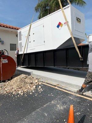 Commercial diesel generator being perfectly placed on the concrete slab.