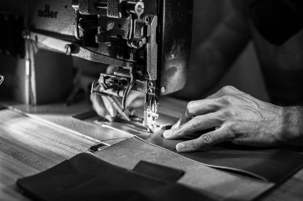 Sewing leather in our Tradeshop, located at 3042 16th Street, San Francisco, CA