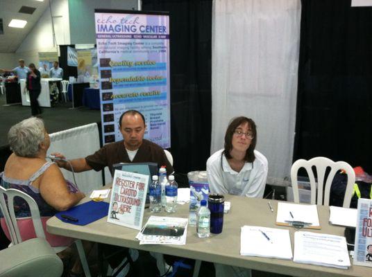 Sy and Lotus at the 2013 Golden Future's Expo - ETI booth providing free Carotid screenings