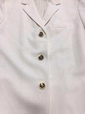 NEW BUTTONS ON WOMEN'S JACKET