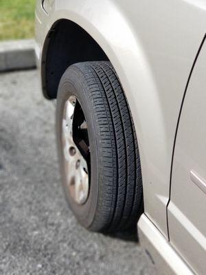 Ream of vehicle ripped while entering car wash.