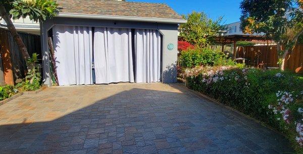 Back part of driveway. I had my house reroofed last year, and you can see I used the pavers for my inspiration.