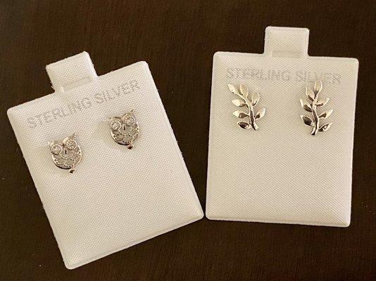 Owl earrings (left), branch earrings (right)