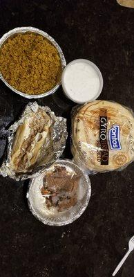 Chicken shawarma (no lettuce or tomato), side of rice, pack of pitas, large side of tzatziki, several pieces chicken souvlaki