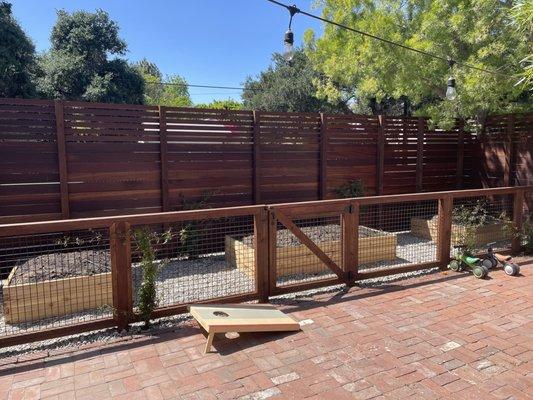 Installed veggie garden/plants/gravel