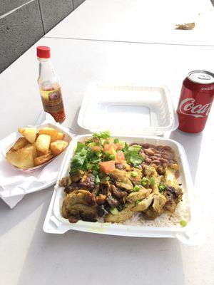 Frango grelhado (grilled chicken), with a side of fried yuca.