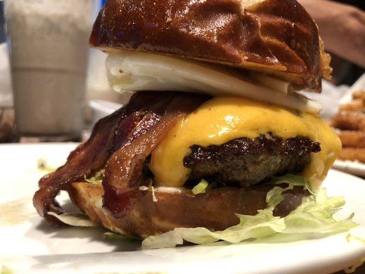 Breakfast burger on pretzel bun