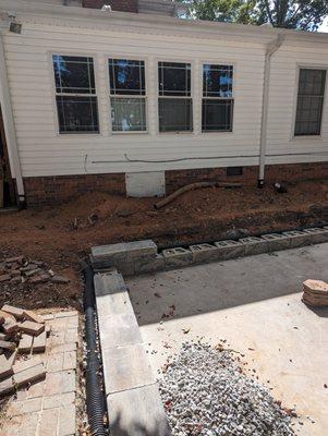 Stone block retaining wall + irrigation system!