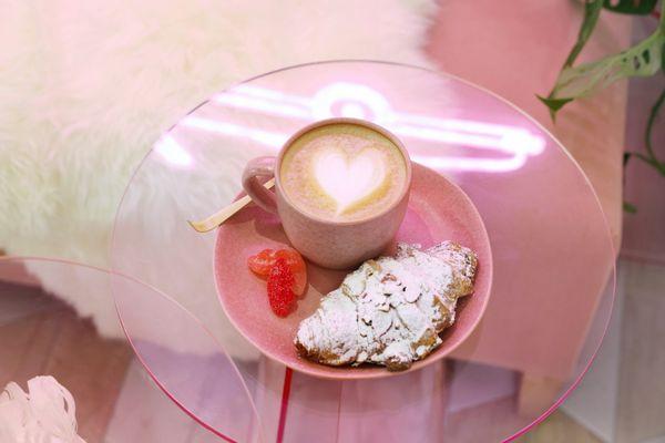 Creamy latte and pastry from Gene's Cafe