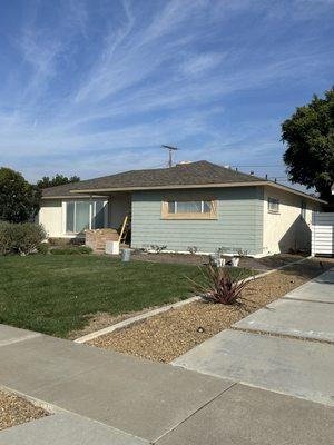 Sanded our siding and made sure to remove old paint.